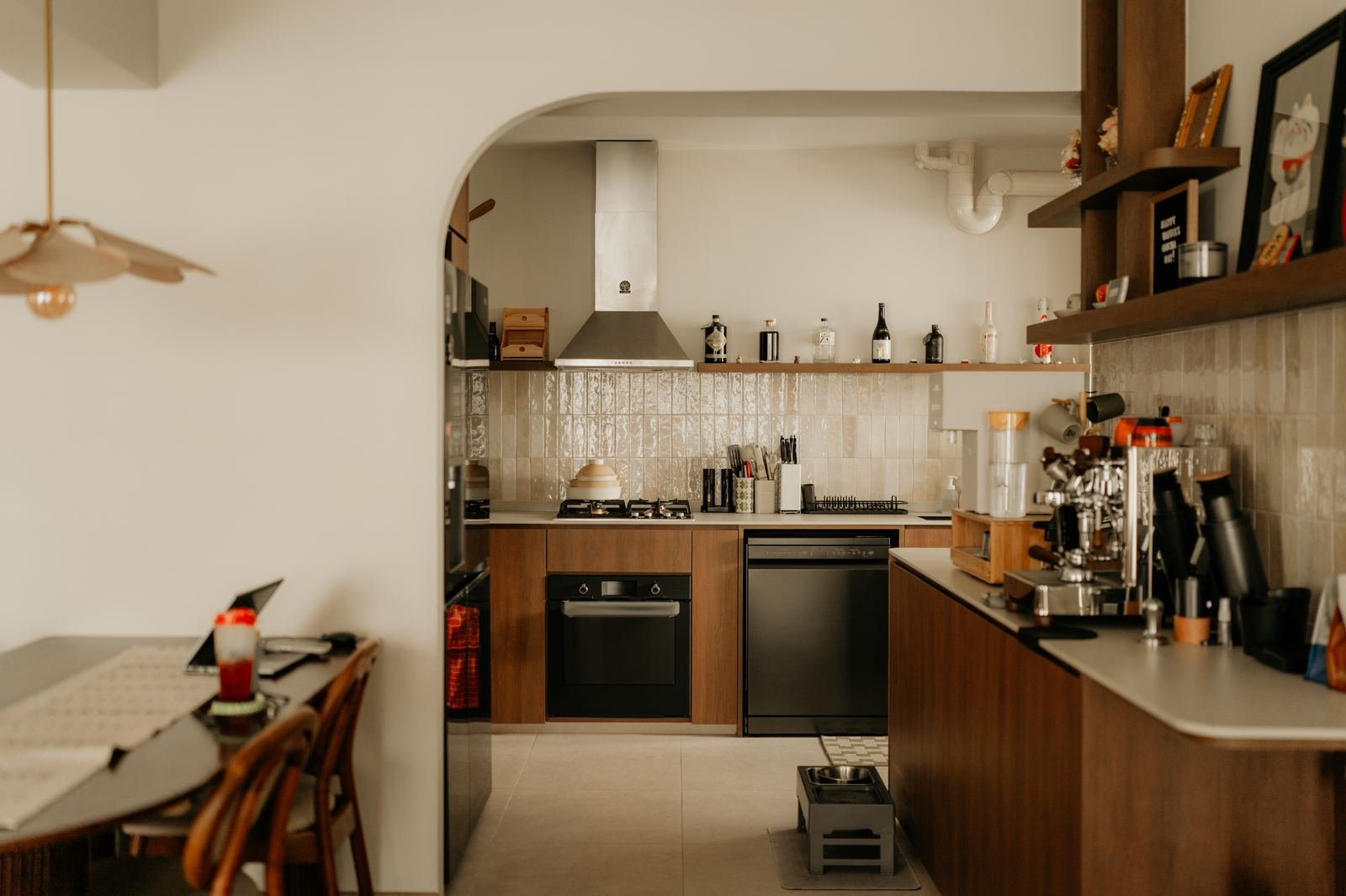 Mid-century Singapore kitchen with arched doorway, photographed by youstaywhere